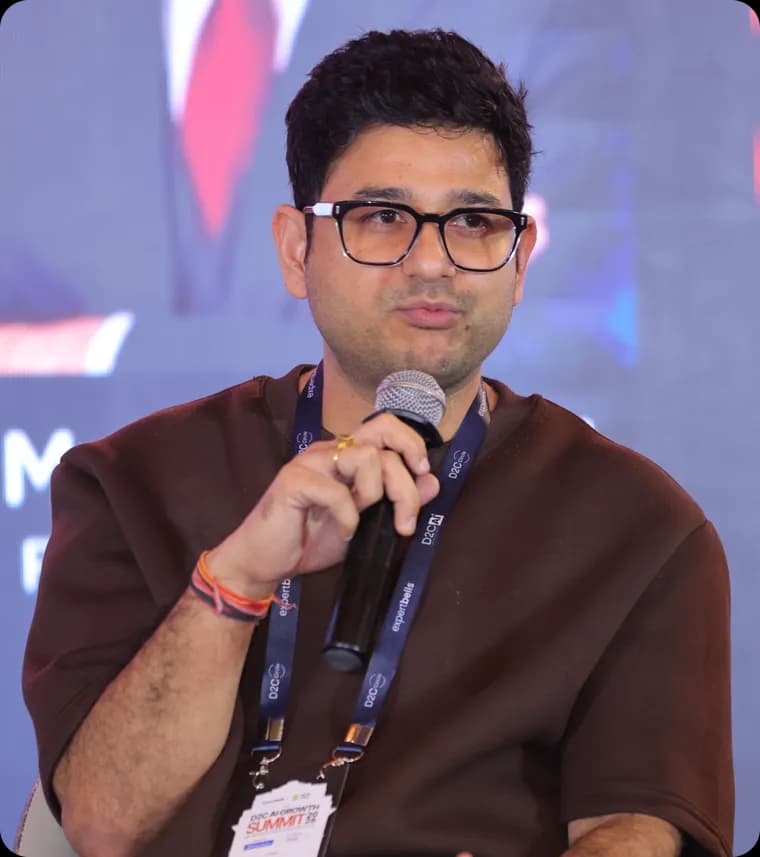 A speaker sharing his story with a microphone